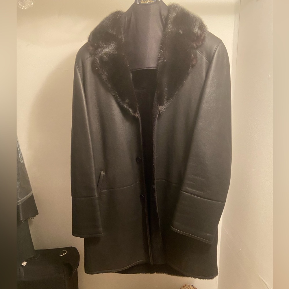 Leather coat with fur inside